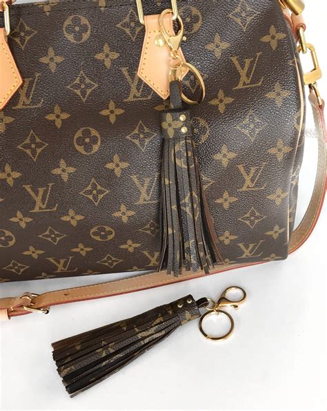 louis vuitton tassel bag charm|louis vuitton bag charm dupe.